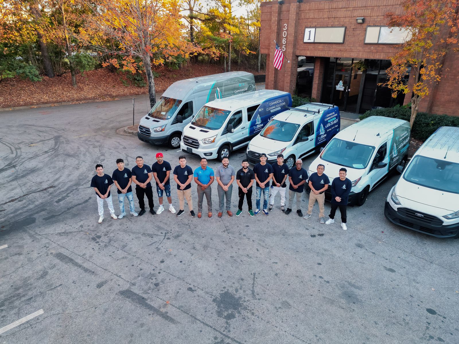 TruShine Services team of 14 kitchen compliance technicians with branded fleet vehicles in Atlanta Georgia